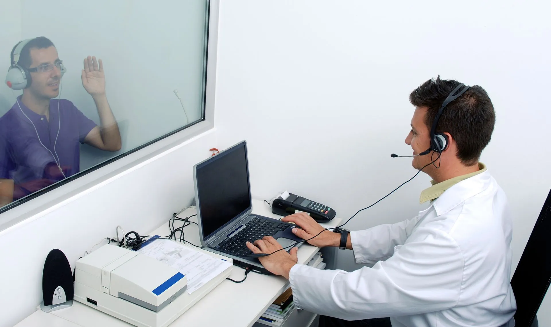 Audiologist performing a hearing test in North Vancouver